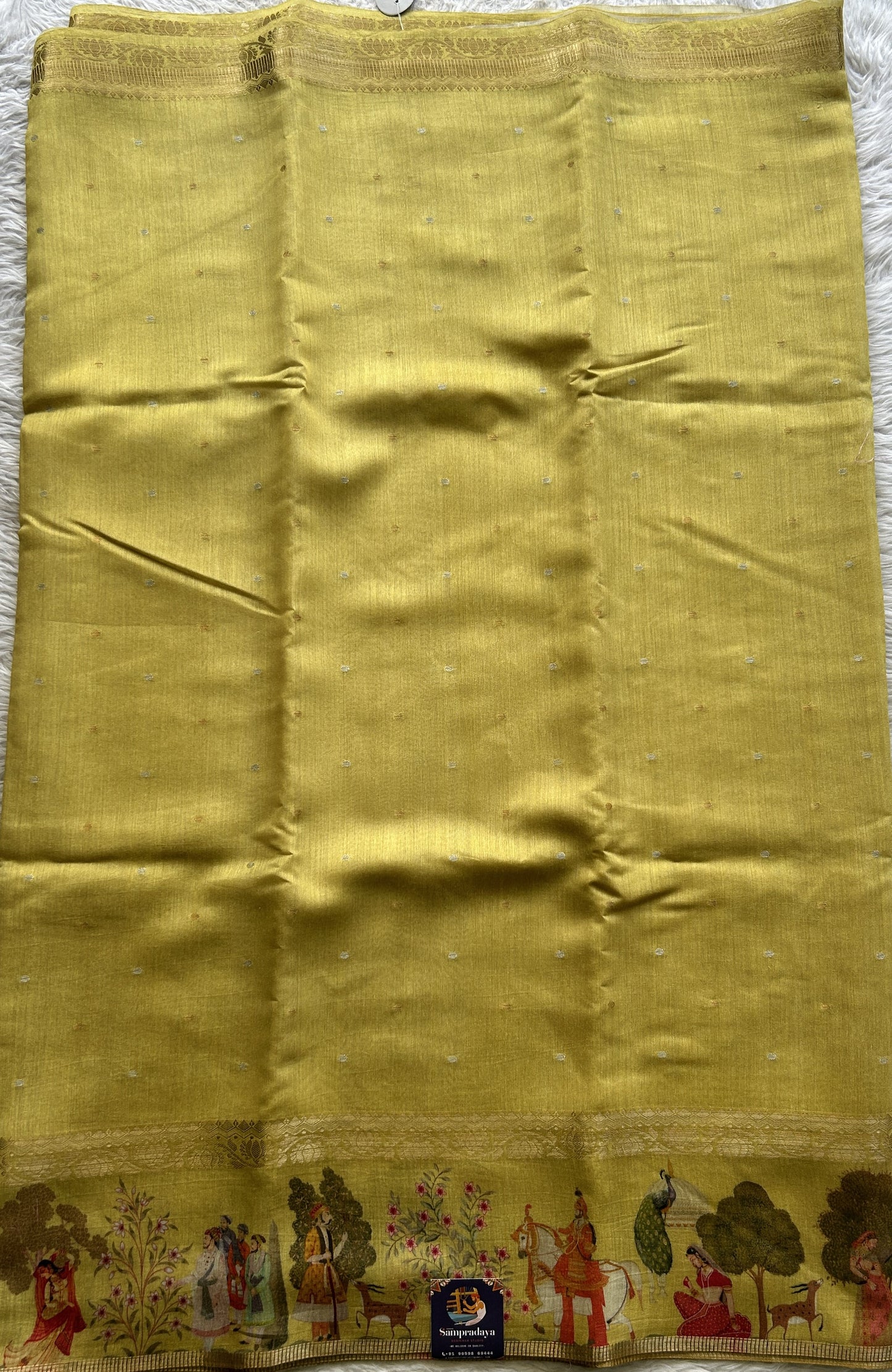 Pure Moonga Tussar Silk Saree Mustard Color Complemented with a Digital Print Border. - Sampradaya Designer Studio