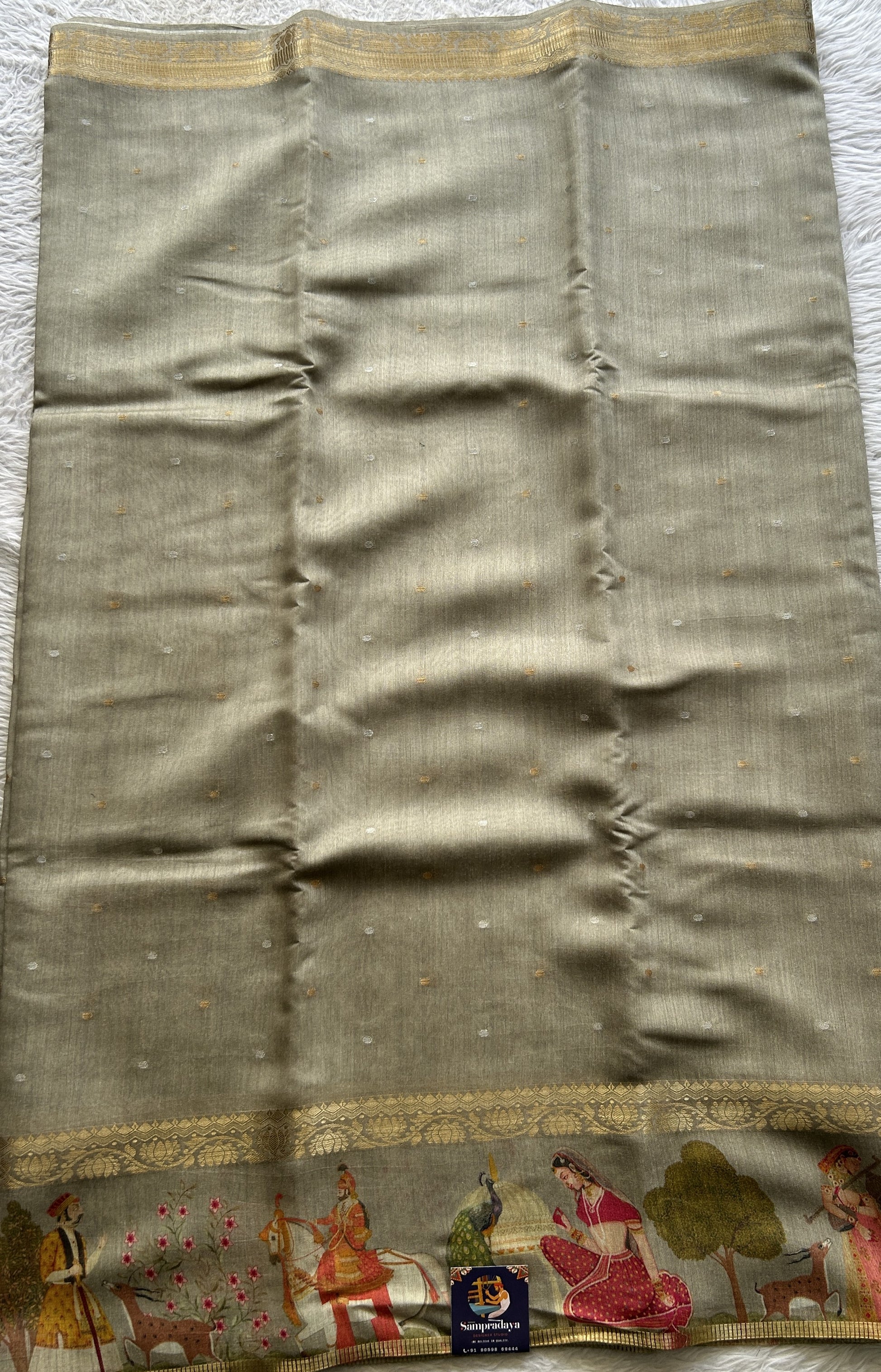 Pure Moonga Tussar Silk Saree Ash Color Complemented with a Digital Print Border. - Sampradaya Designer Studio