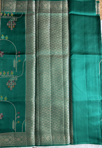 Pure Chiniya Silk Saree Rama Green Colored Elegantly Paired with a Gold Zari Border.