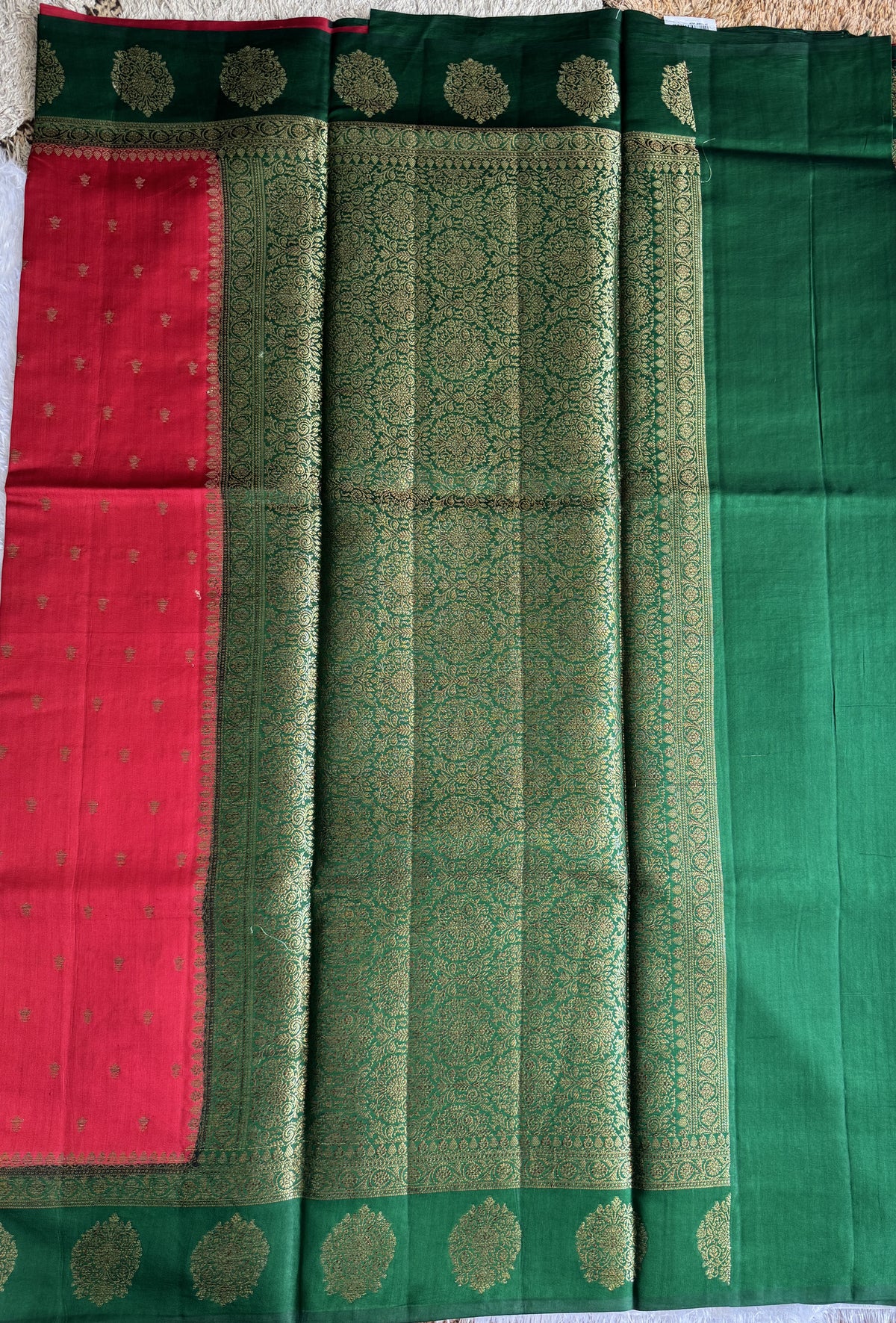 Pure Chiniya Silk Saree Red Colored Elegantly Paired with a Gold Zari Border.