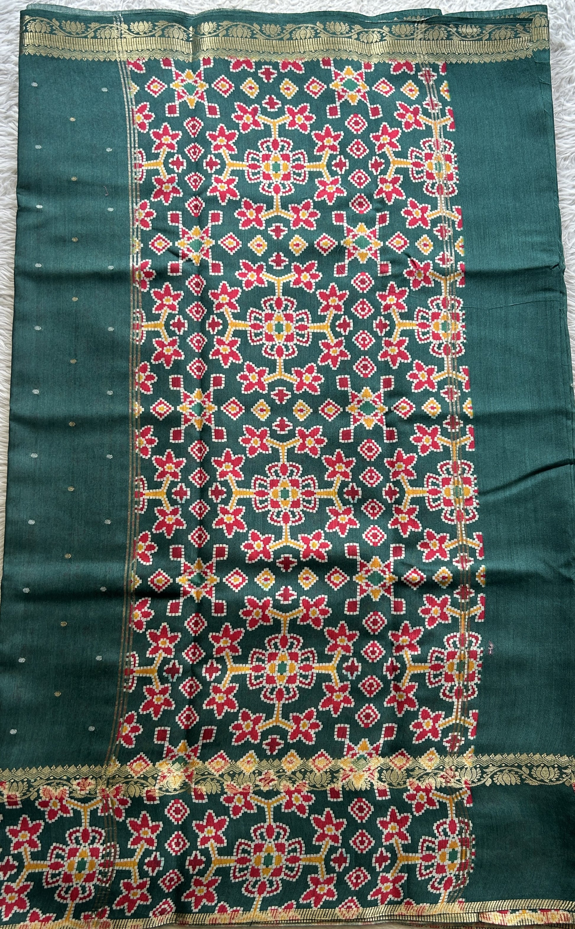 Pure Moonga Tussar Silk Saree Peacock Green Color Complemented with a Patolla Border. - Sampradaya Designer Studio