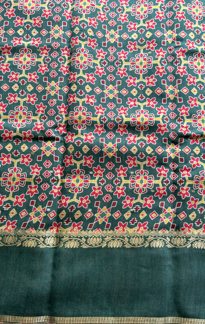 Pure Moonga Tussar Silk Saree Peacock Green Color Complemented with a Patolla Border. - Sampradaya Designer Studio