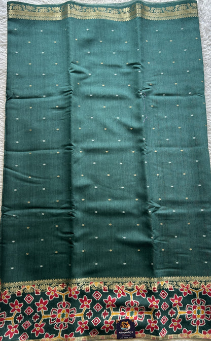 Pure Moonga Tussar Silk Saree Peacock Green Color Complemented with a Patolla Border. - Sampradaya Designer Studio