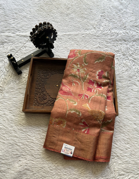 Pure Tussar Silk Saree Coral Color Complemented with a Zari Border. - Sampradaya Designer Studio