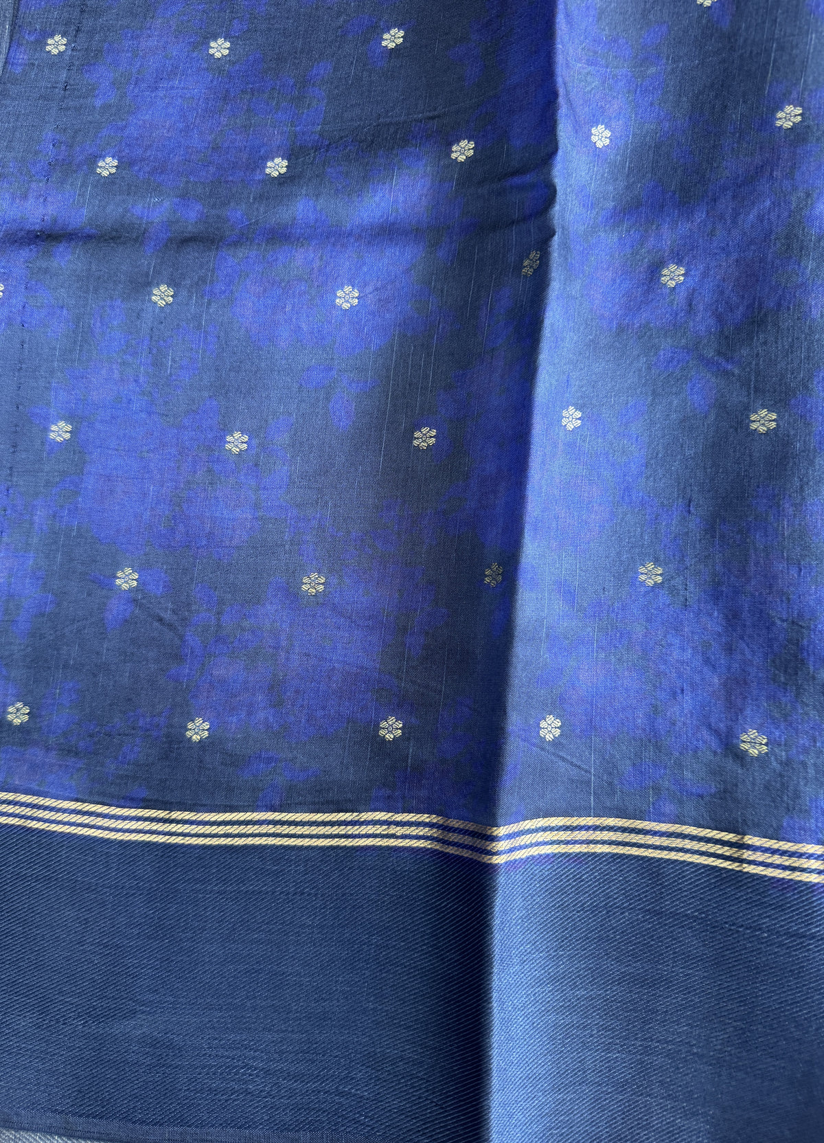 Pure Chiniya Silk Saree Navy Blue Colored Elegantly Paired with a Gold Zari Border.