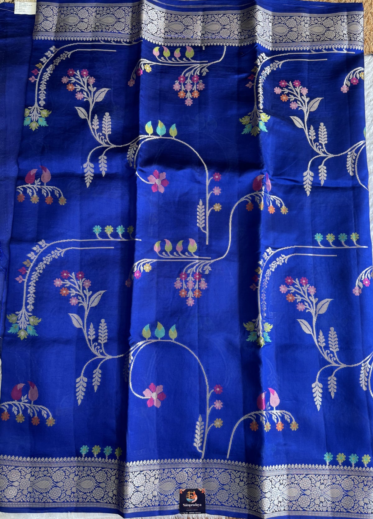 Pure Chiniya Silk Saree Blur Colored Elegantly Paired with a Gold Zari Border.