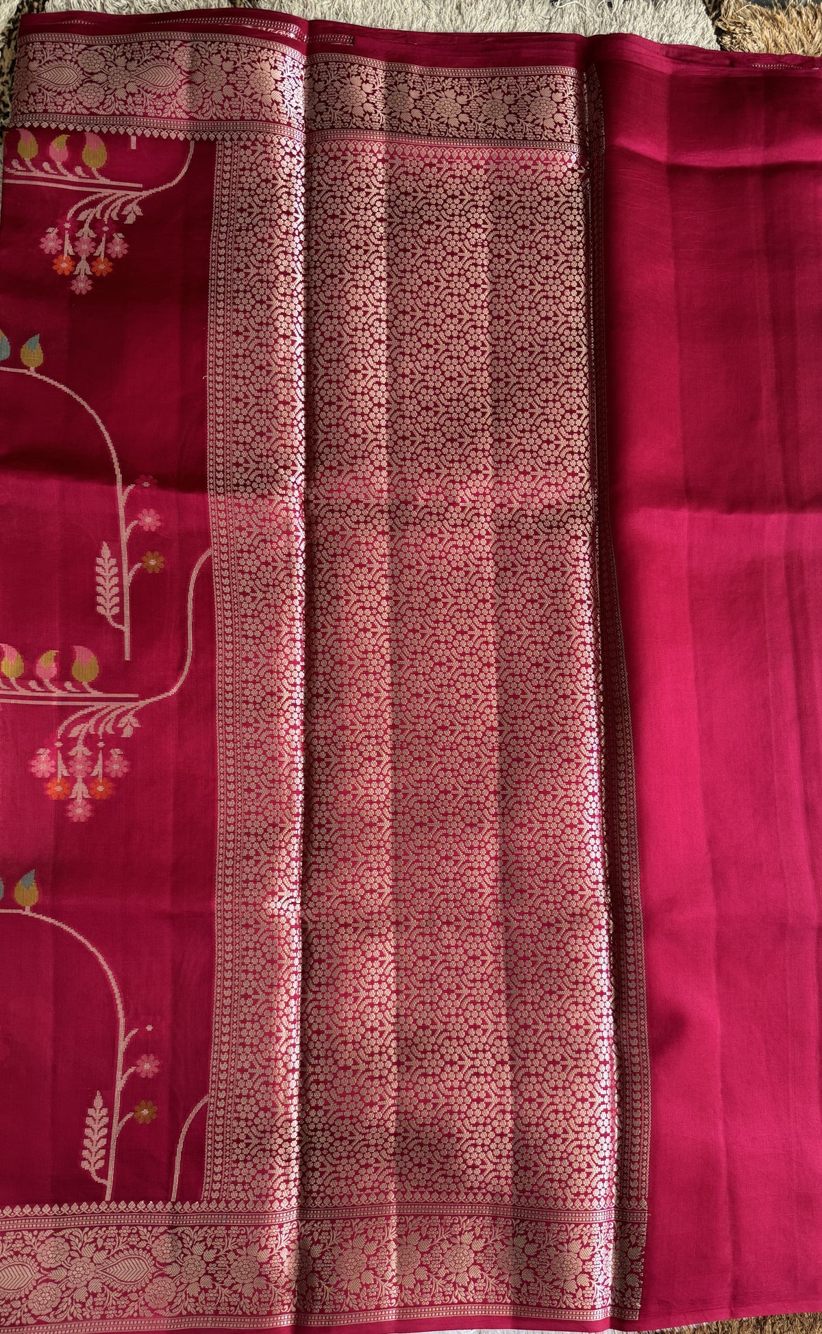 Pure Chiniya Silk Saree Rani Pink Colored Elegantly Paired with a Gold Zari Border.