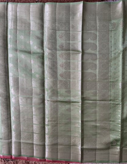 Pure Chiniya Silk Saree Sea Green Colored Elegantly Paired with a Gold Zari Border.