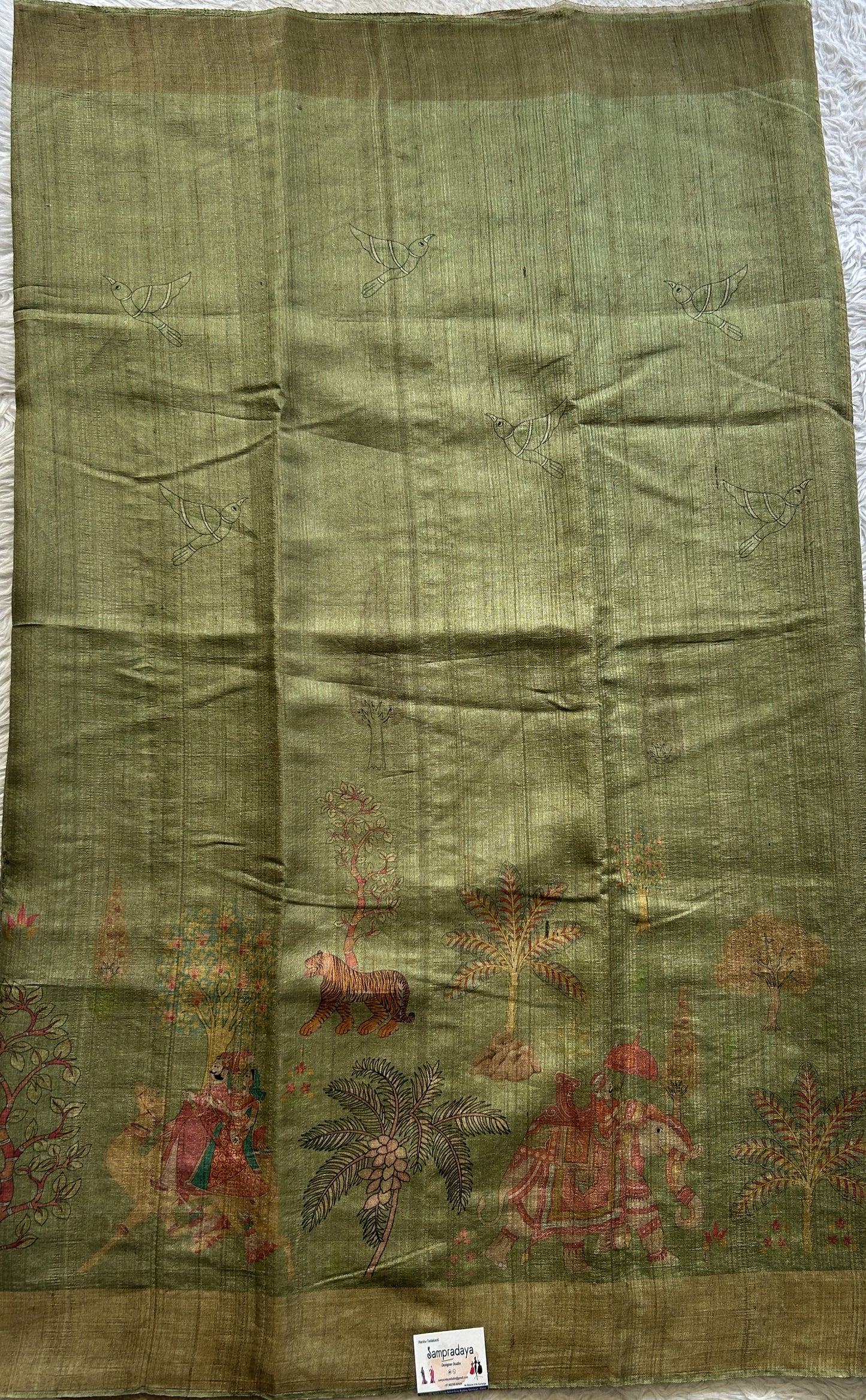 Pure Tussar Silk Saree Olive Green Color Complemented with a Zari Border. - Sampradaya Designer Studio
