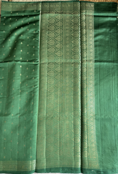 Pure Chiniya Silk Saree Sea Green Colored Elegantly Paired with a Gold Zari Border.