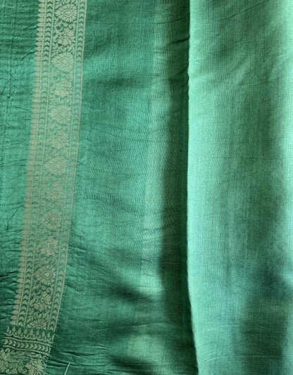 Pure Chiniya Silk Saree Sea Green Colored Elegantly Paired with a Gold Zari Border.