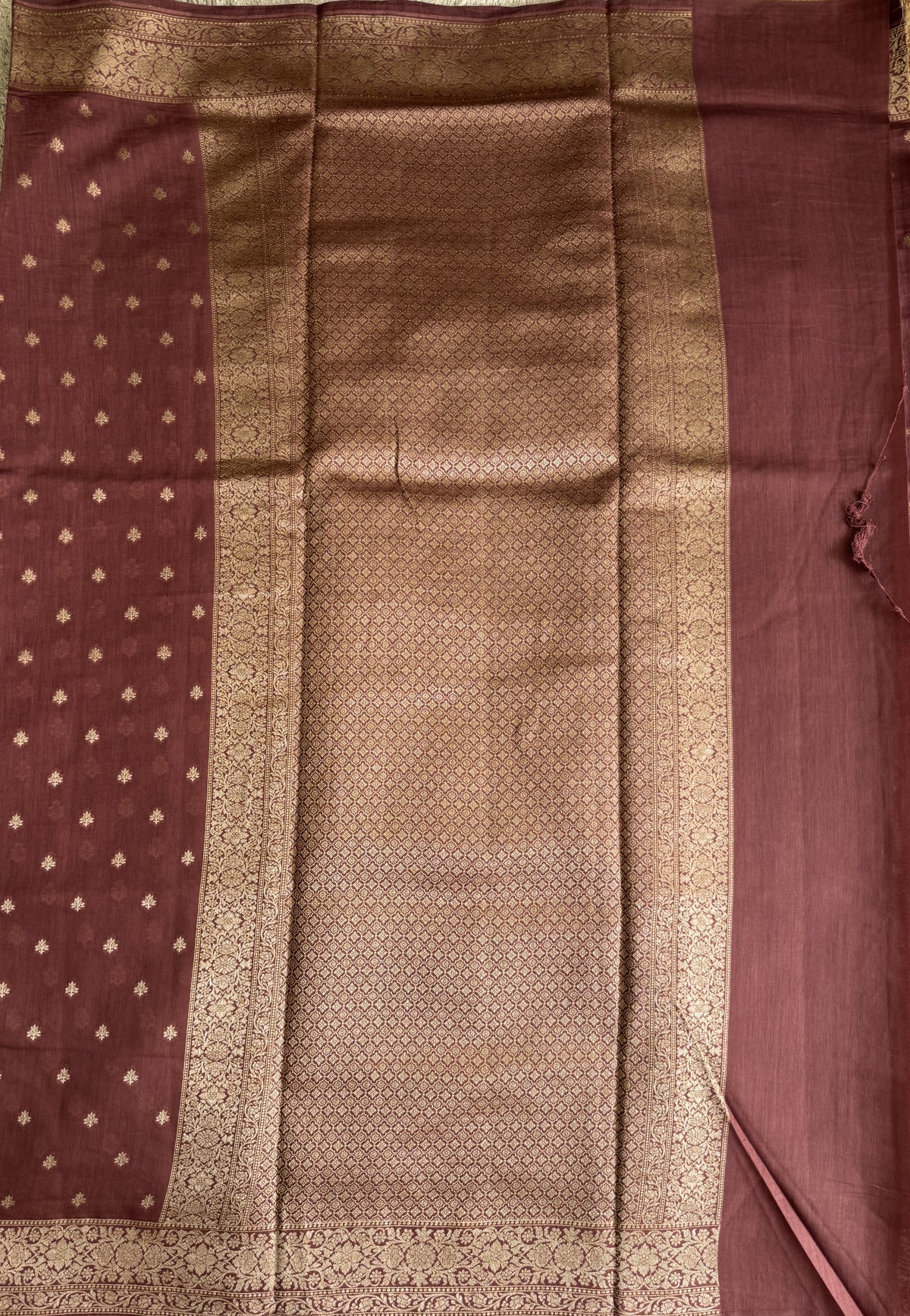 Pure Chiniya Silk Saree Walnut PColored Elegantly Paired with a Gold Zari Border.