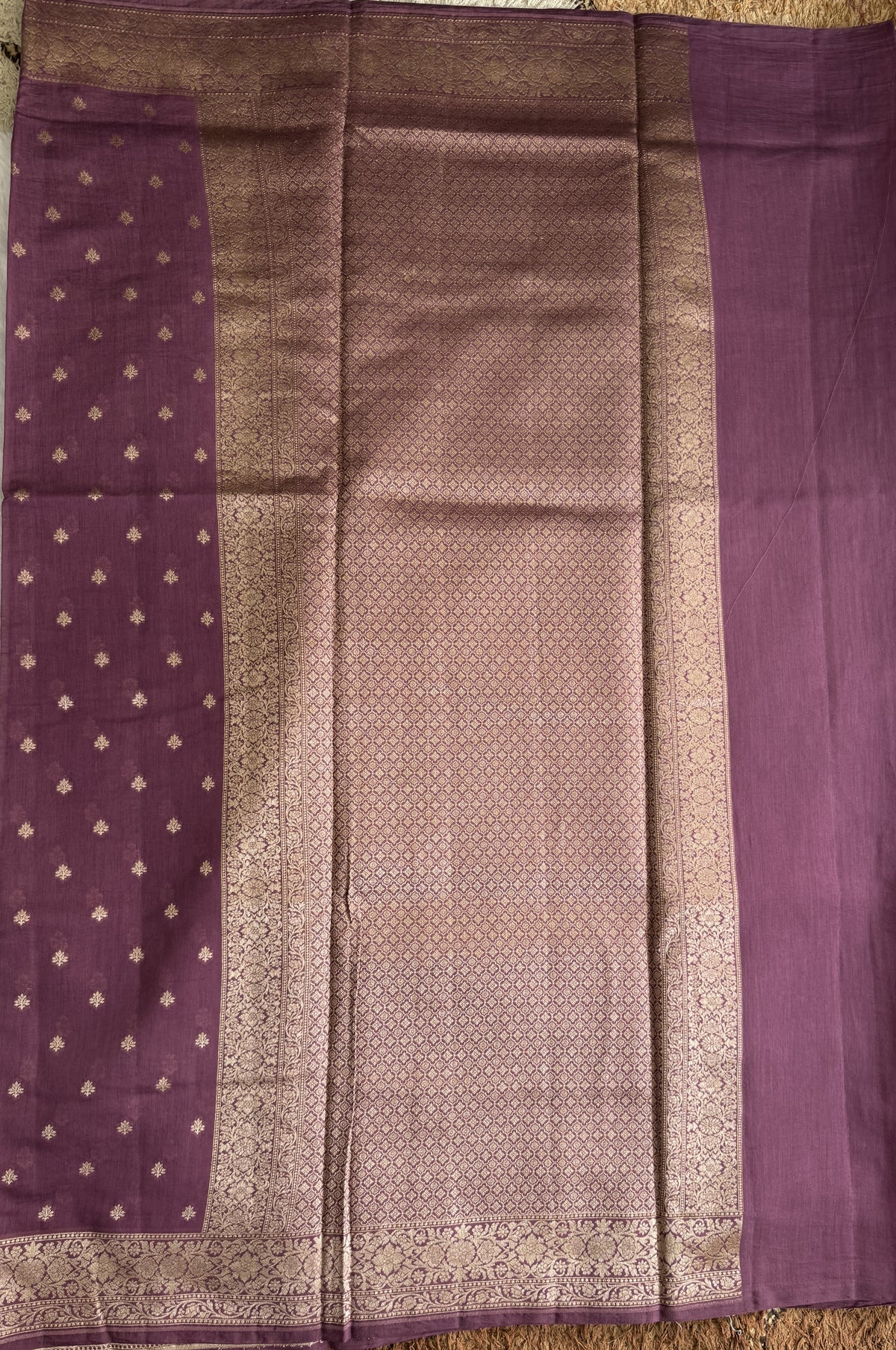 Pure Chiniya Silk Saree warm Plum Colored Elegantly Paired with a Gold Zari Border.