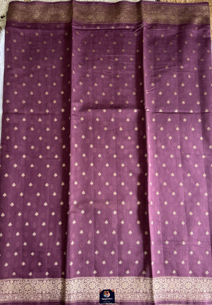 Pure Chiniya Silk Saree warm Plum Colored Elegantly Paired with a Gold Zari Border.