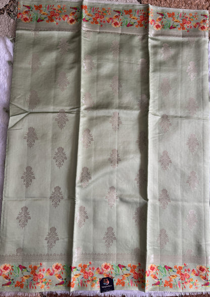 Pure Chiniya Silk Saree Sea Green Colored Elegantly Paired with a Gold Zari Border.
