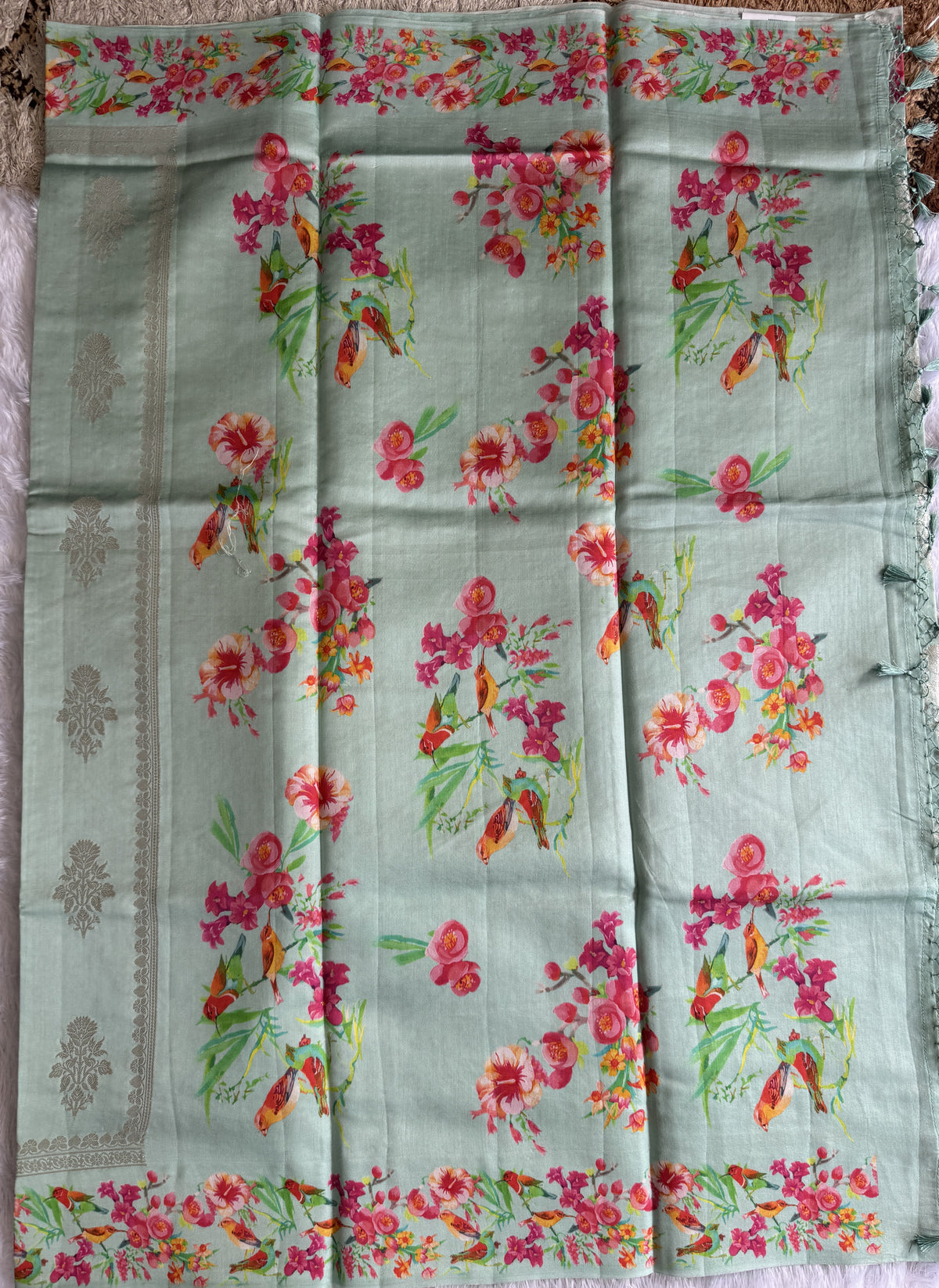 Pure Chiniya Silk Saree Ice Blue Colored Elegantly Paired with a Gold Zari Border.