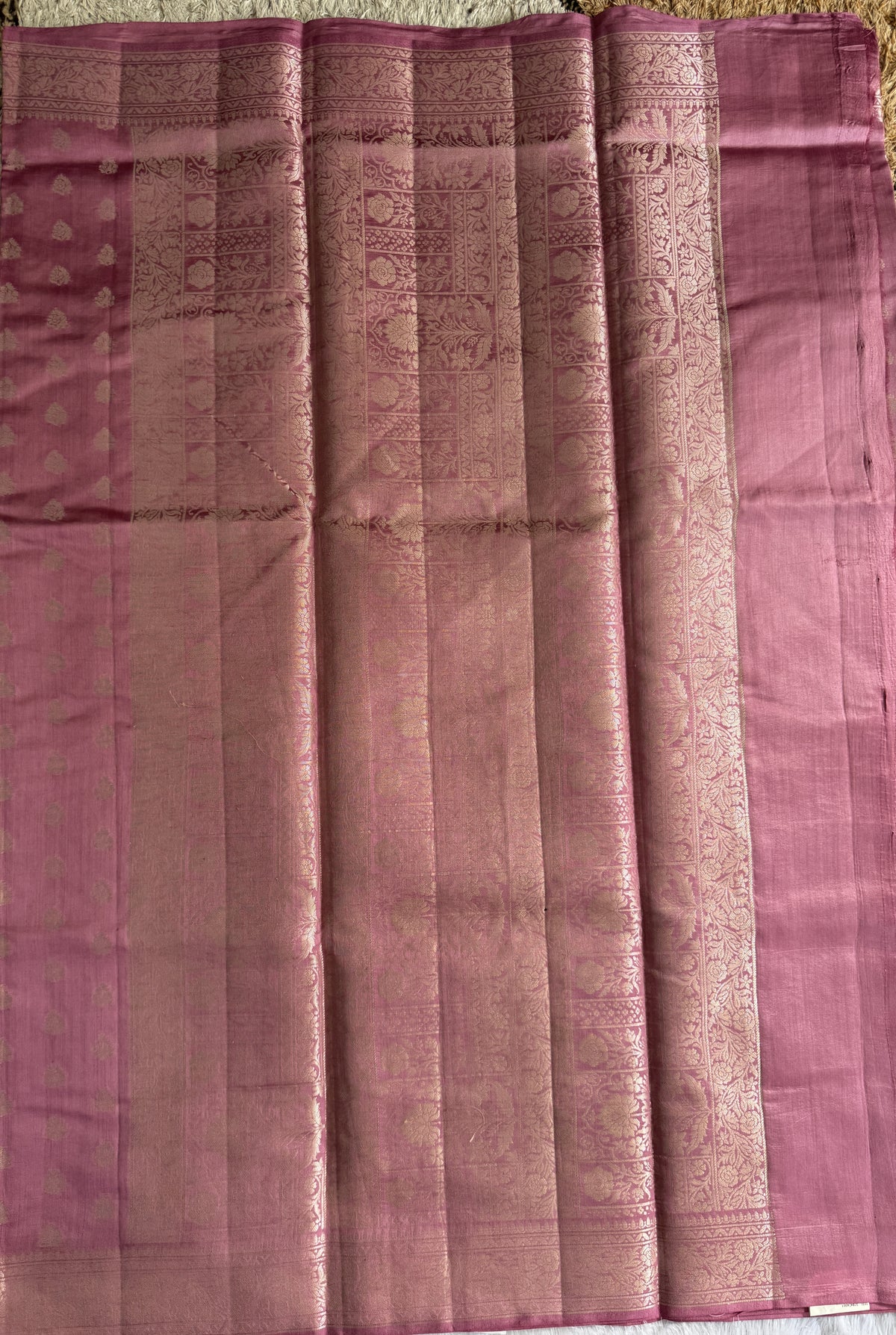 Pure Chiniya Silk Saree Baby Pink Colored Elegantly Paired with a Gold Zari Border.