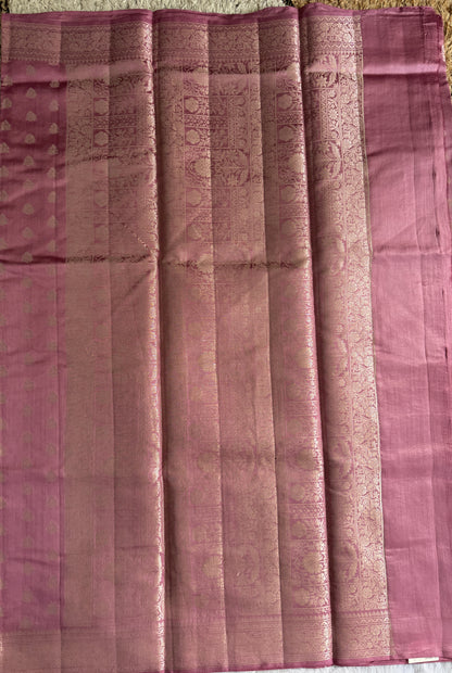 Pure Chiniya Silk Saree Baby Pink Colored Elegantly Paired with a Gold Zari Border.