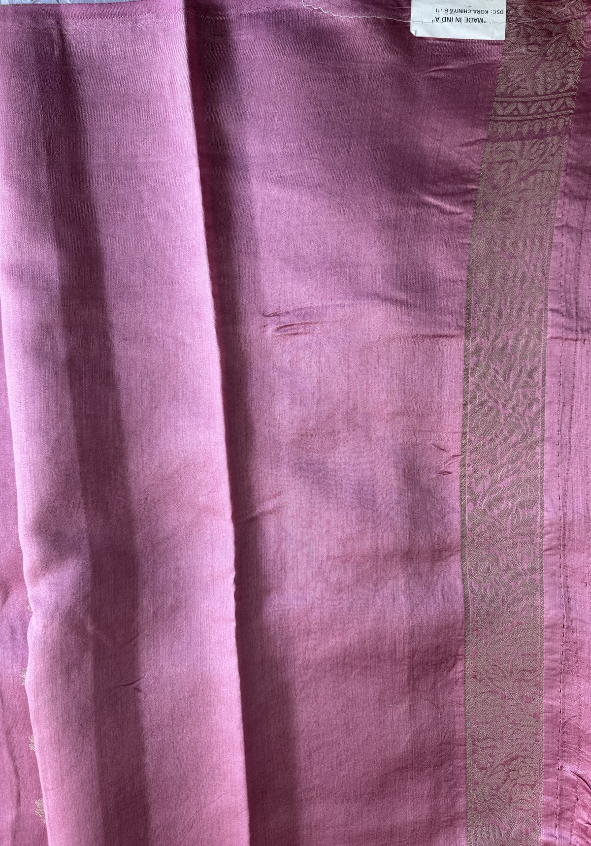 Pure Chiniya Silk Saree Baby Pink Colored Elegantly Paired with a Gold Zari Border.