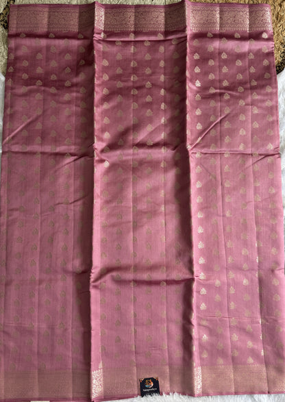 Pure Chiniya Silk Saree Baby Pink Colored Elegantly Paired with a Gold Zari Border.