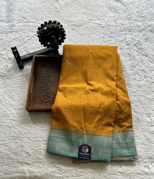 Semi Georgette Saree Yellow Colored Elegantly Paired with a Zari Border. - Sampradaya Designer Studio