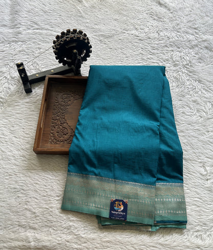 Semi Georgette Saree Sea Blue Colored Elegantly Paired with a Zari Border. - Sampradaya Designer Studio