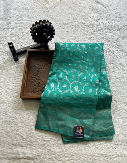 Semi Georgette Saree Sea Green Colored Elegantly Paired with a Zari Border. - Sampradaya Designer Studio