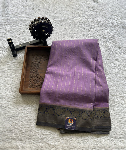 Semi Georgette Saree Lavender Colored Elegantly Paired with a Zari Border. - Sampradaya Designer Studio