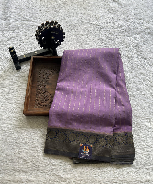 Semi Georgette Saree Lavender Colored Elegantly Paired with a Zari Border. - Sampradaya Designer Studio