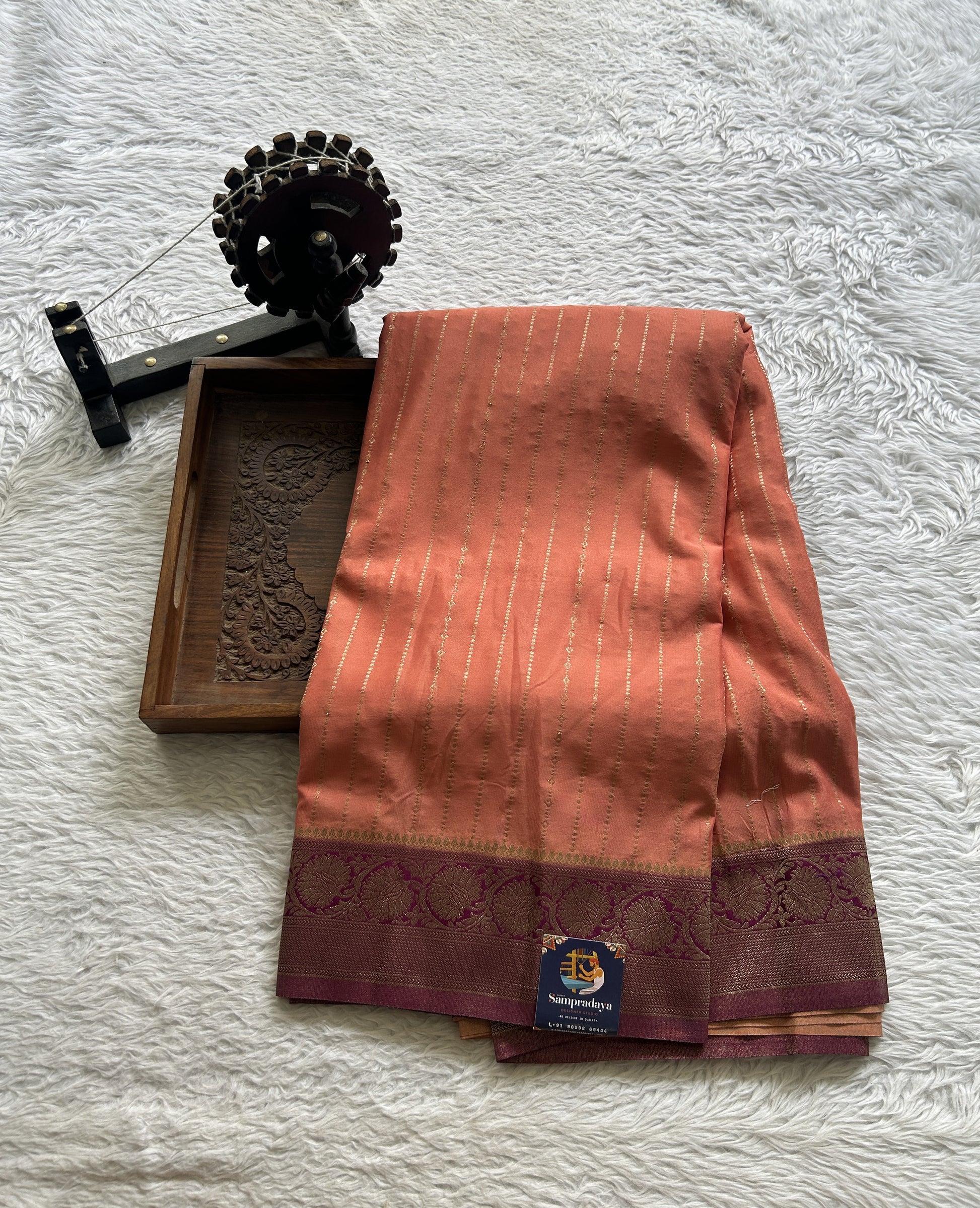 Semi Georgette Saree Peach Colored Elegantly Paired with a Zari Border. - Sampradaya Designer Studio