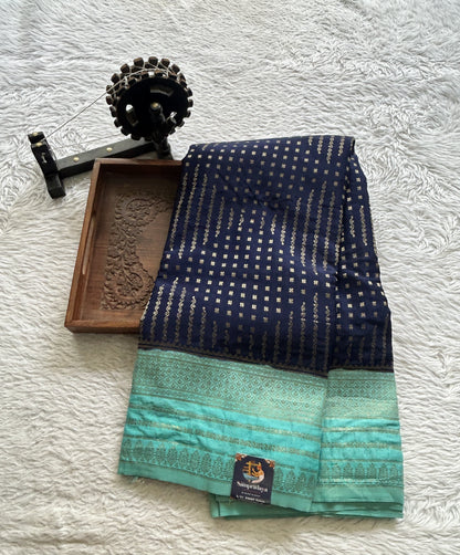 Semi Georgette Saree Navy Blue Colored Elegantly Paired with a Zari Border. - Sampradaya Designer Studio
