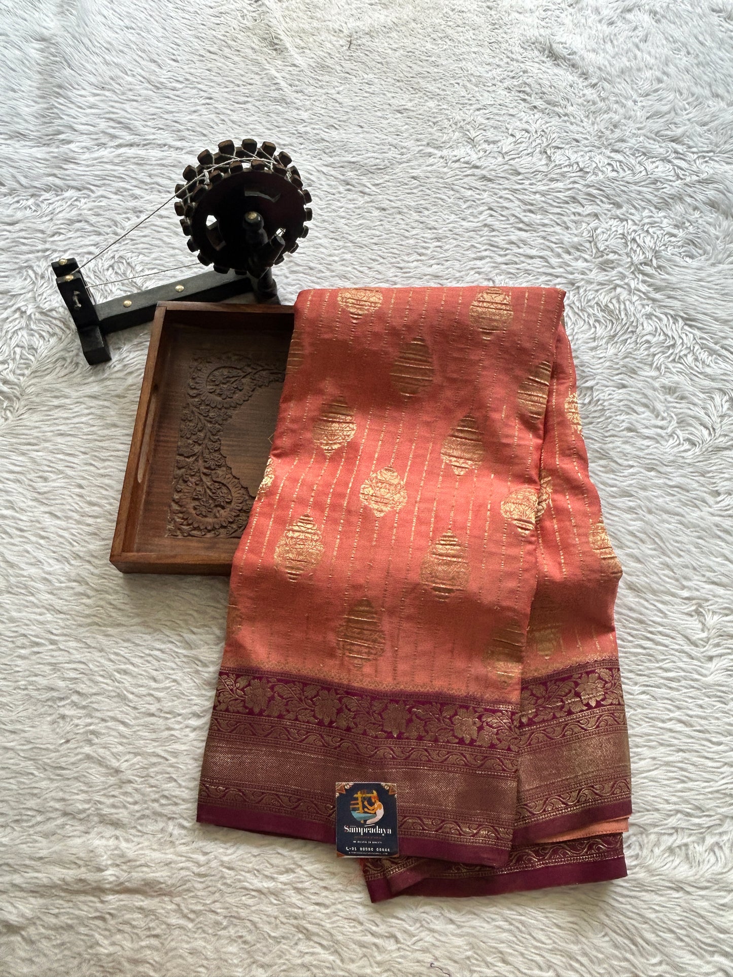 Semi Georgette Saree Dark Peach Colored Elegantly Paired with a Wine Color  Zari Border. - Sampradaya Designer Studio
