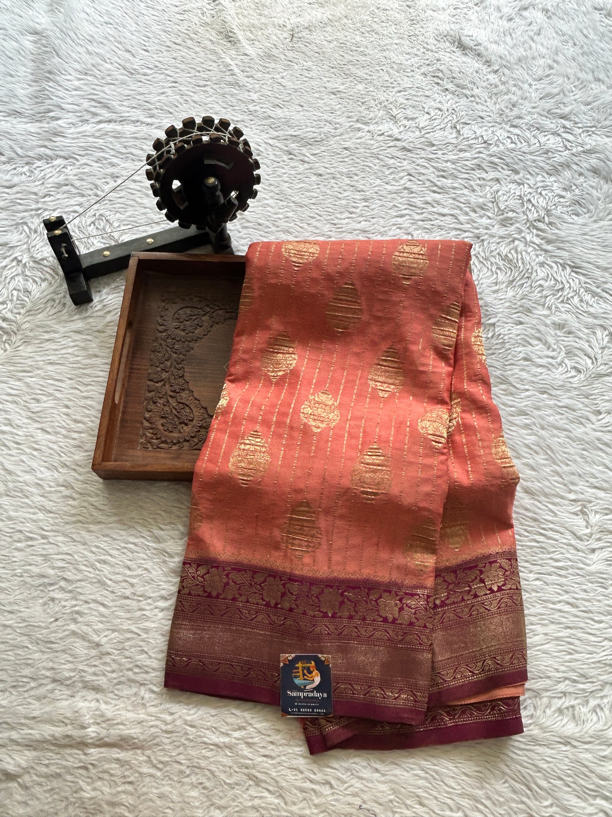 Semi Georgette Saree Dark Peach Colored Elegantly Paired with a Wine Color  Zari Border. - Sampradaya Designer Studio