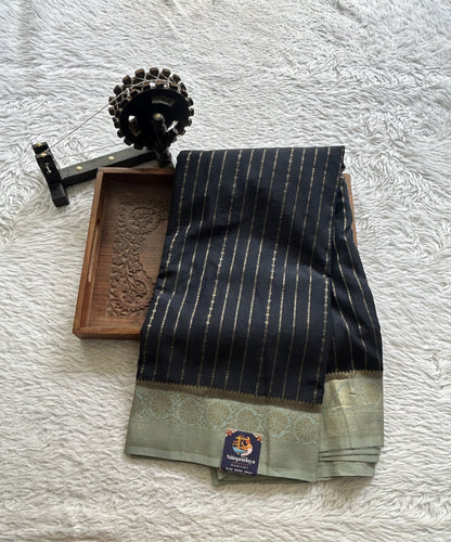 Semi Georgette Saree Black Colored Elegantly Paired with a Zari Border. - Sampradaya Designer Studio