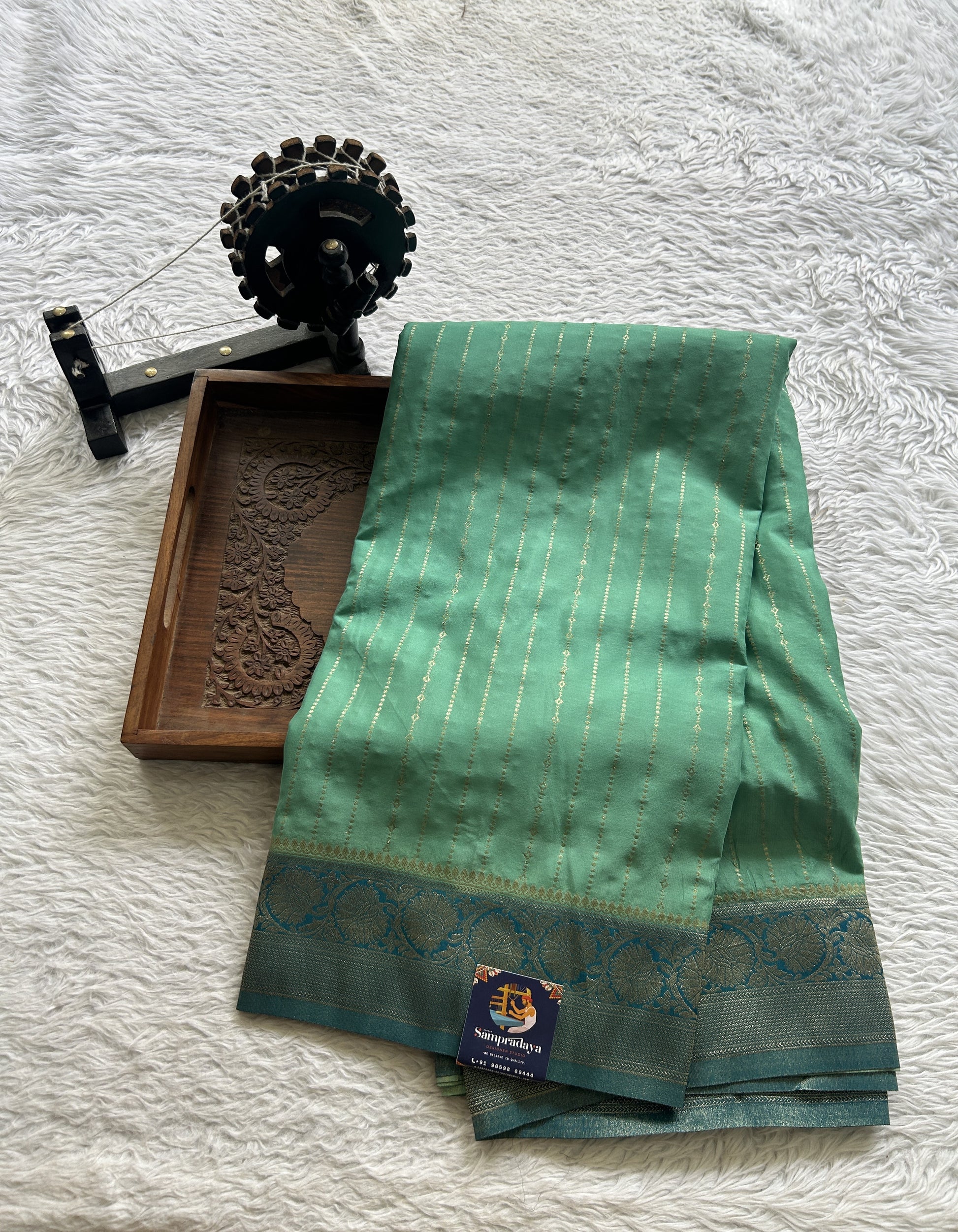 Semi Georgette Saree Aqua Green Colored Elegantly Paired with a Zari Border. - Sampradaya Designer Studio