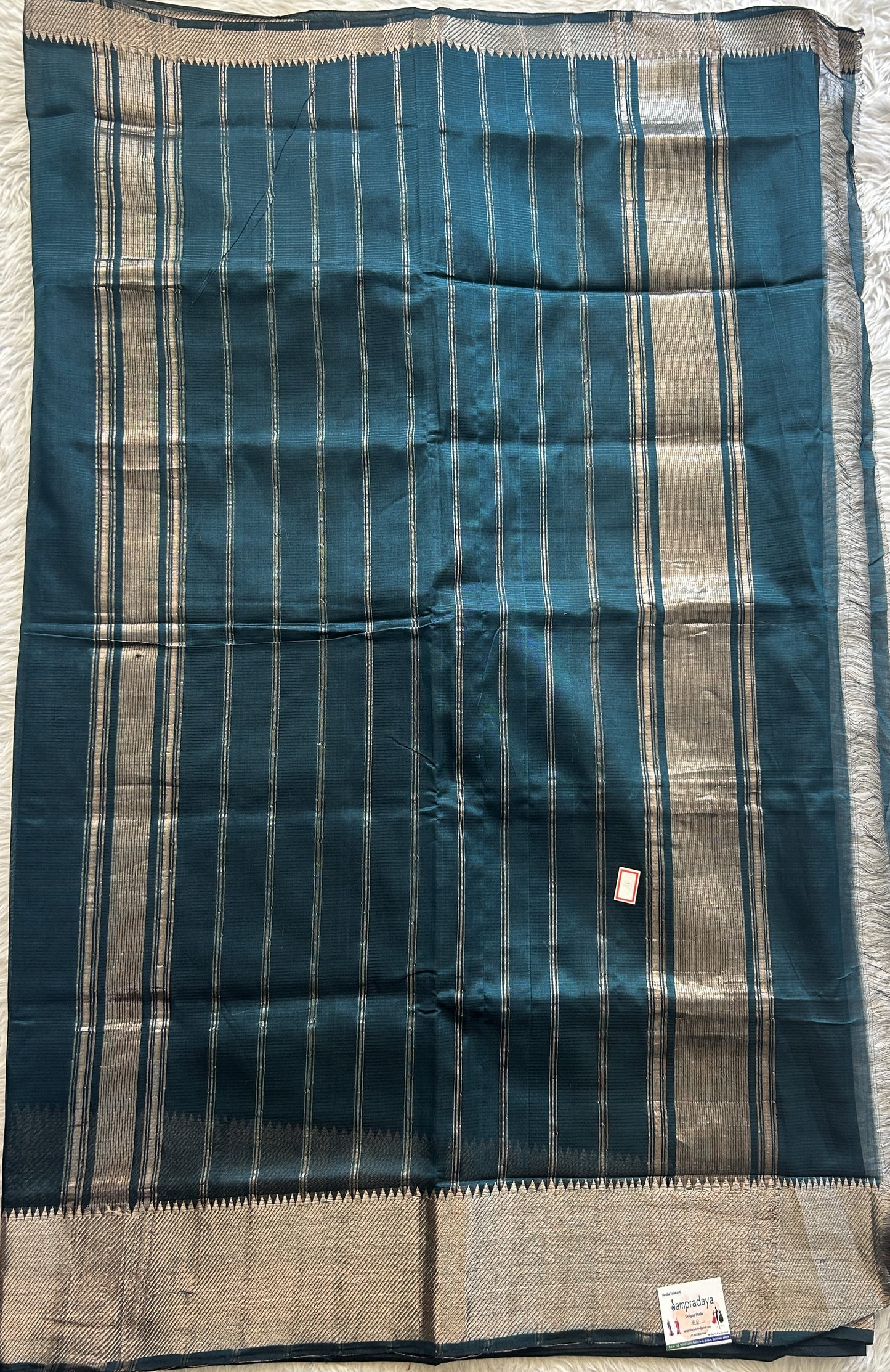 Mangalagiri Plain Pattu Saree Bottle Green colored complemented with a Zari Border - Sampradaya Designer Studio