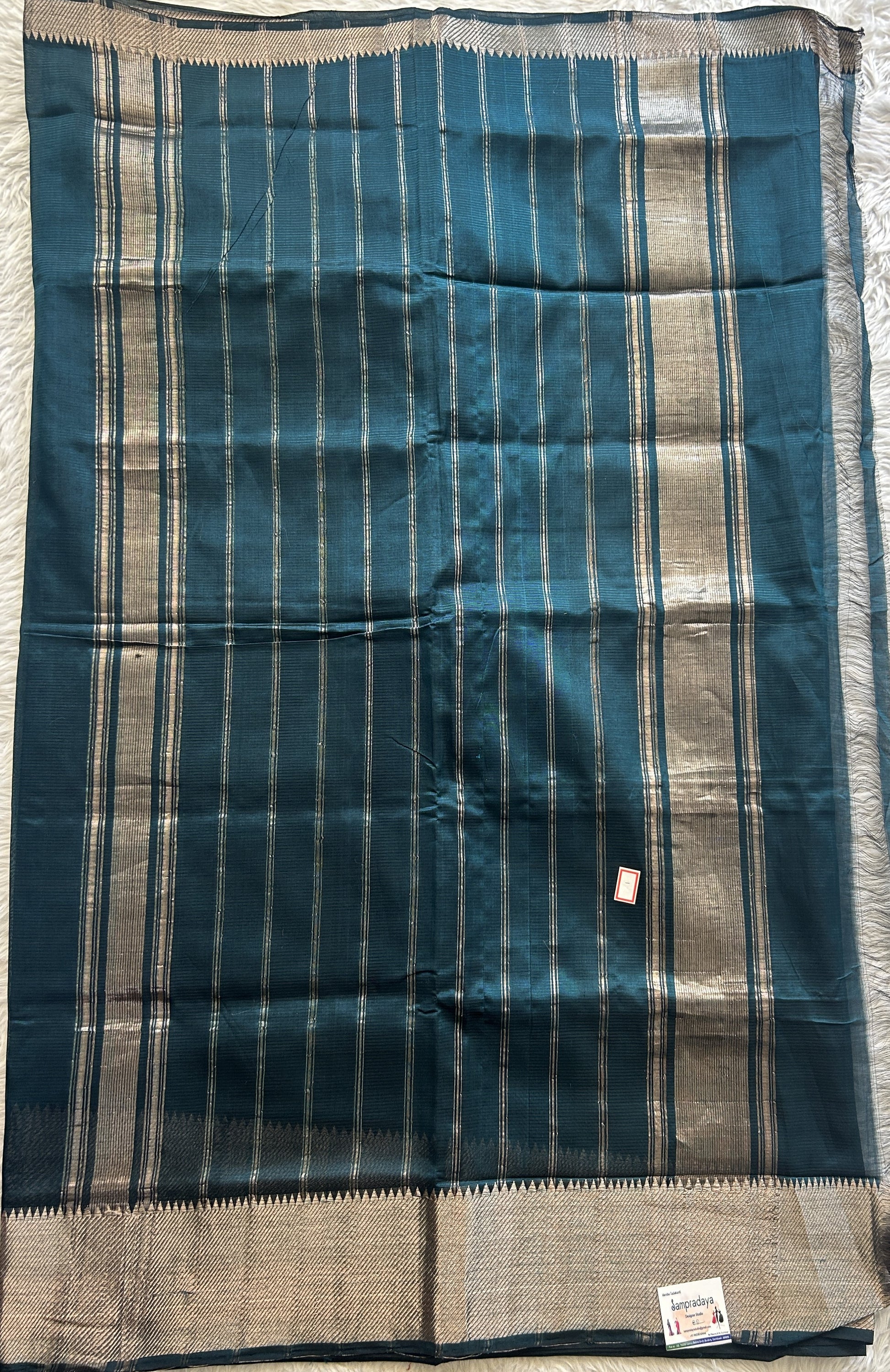 Mangalagiri Plain Pattu Saree Bottle Green colored complemented with a Zari Border - Sampradaya Designer Studio