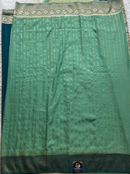 Semi Georgette Saree Aqua Green Colored Elegantly Paired with a Zari Border. - Sampradaya Designer Studio