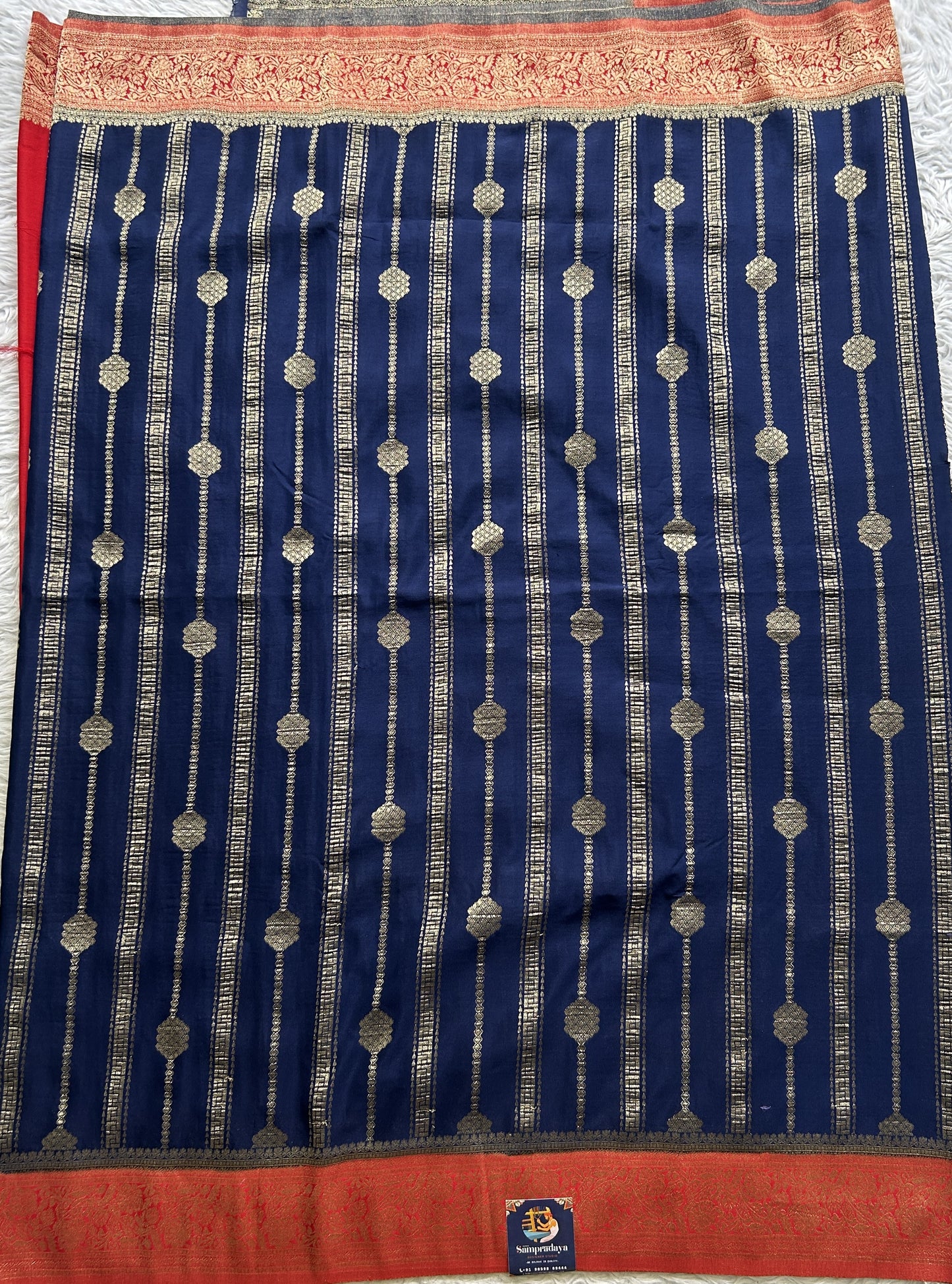 Semi Georgette Saree Ink Blue Colored Elegantly Paired with a Zari Border. - Sampradaya Designer Studio