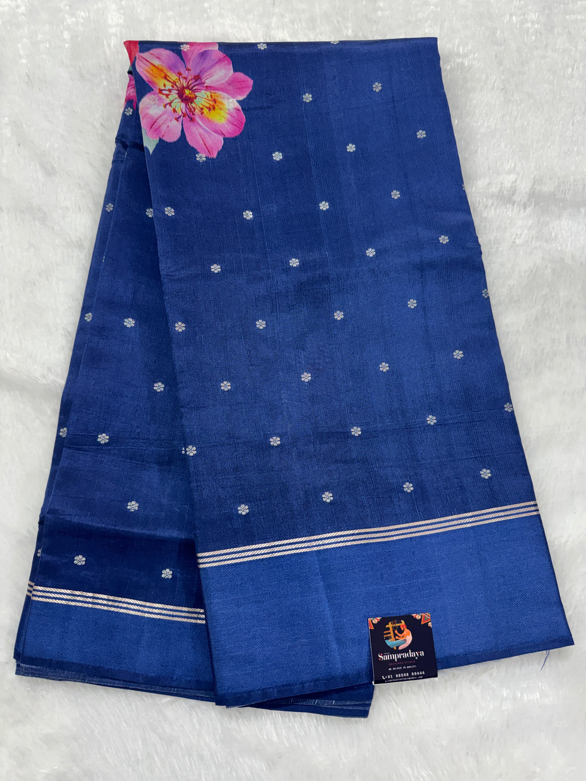 Pure Chiniya Silk Saree Navy Blue Colored Elegantly Paired with a Gold Zari Border.