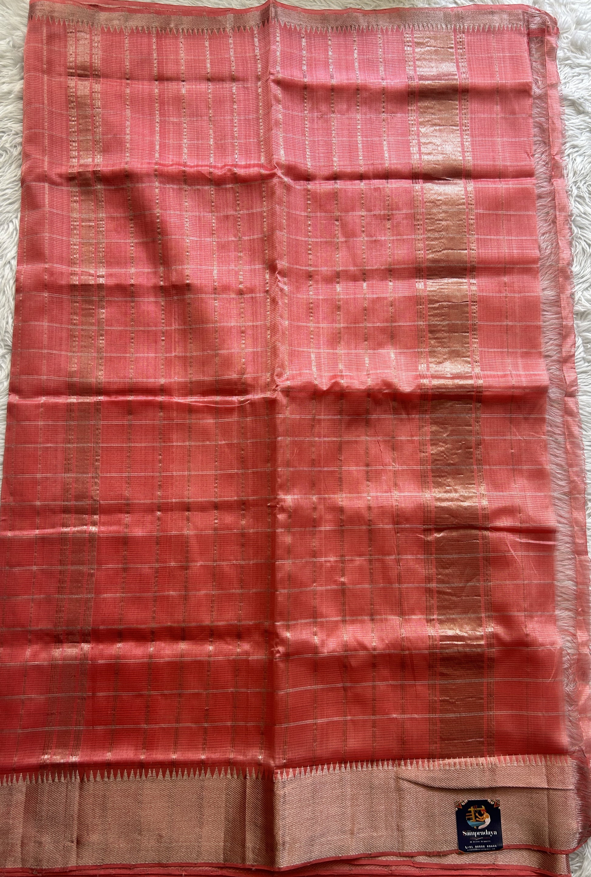Mangalagiri Checks Pattu Saree Peach colored complemented with a Zari Border - Sampradaya Designer Studio