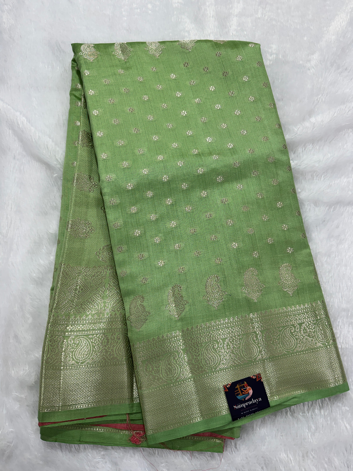 Pure Chiniya Silk Saree Sea Green Colored Elegantly Paired with a Gold Zari Border.