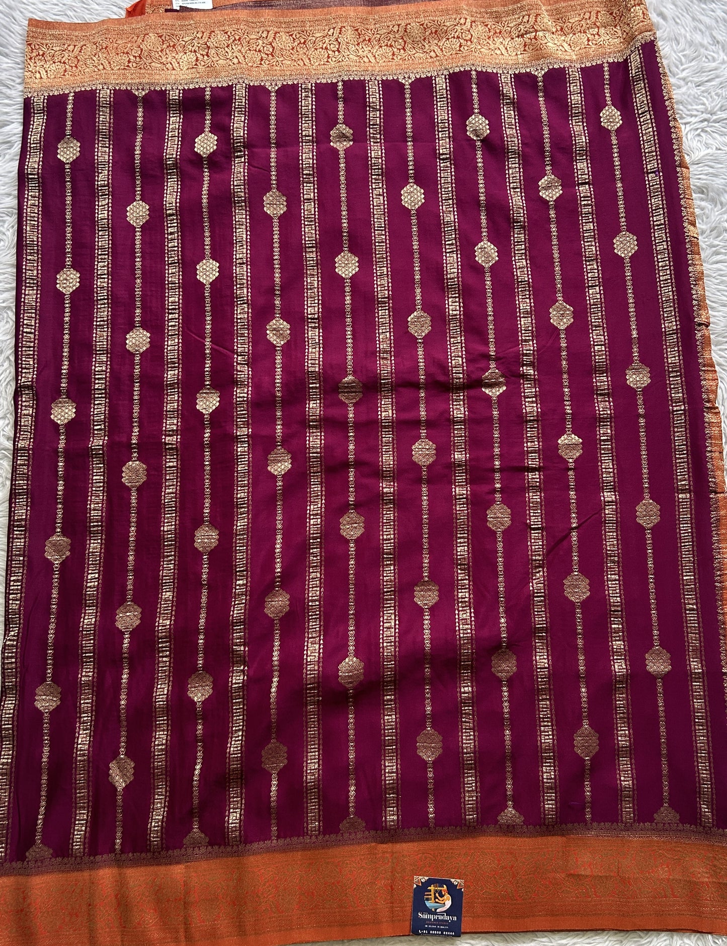 Semi Georgette Saree Purple Colored Elegantly Paired with a Zari Border. - Sampradaya Designer Studio