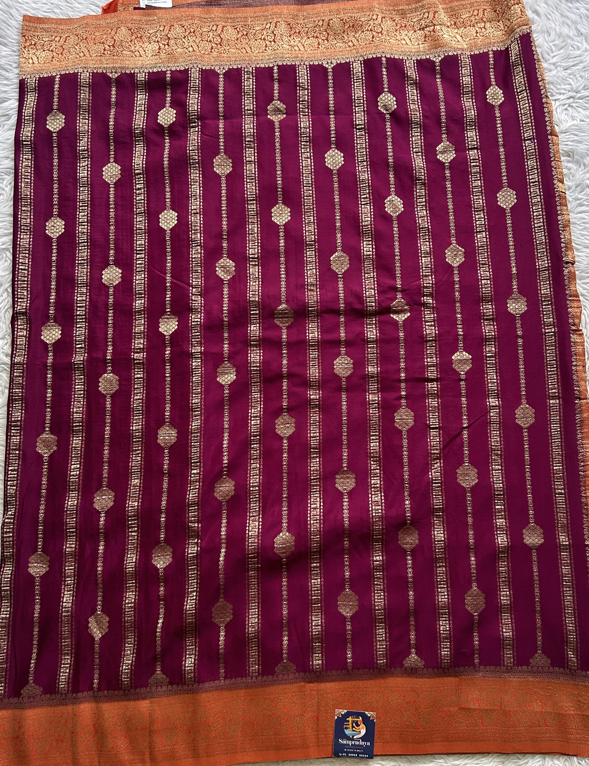 Semi Georgette Saree Purple Colored Elegantly Paired with a Zari Border. - Sampradaya Designer Studio