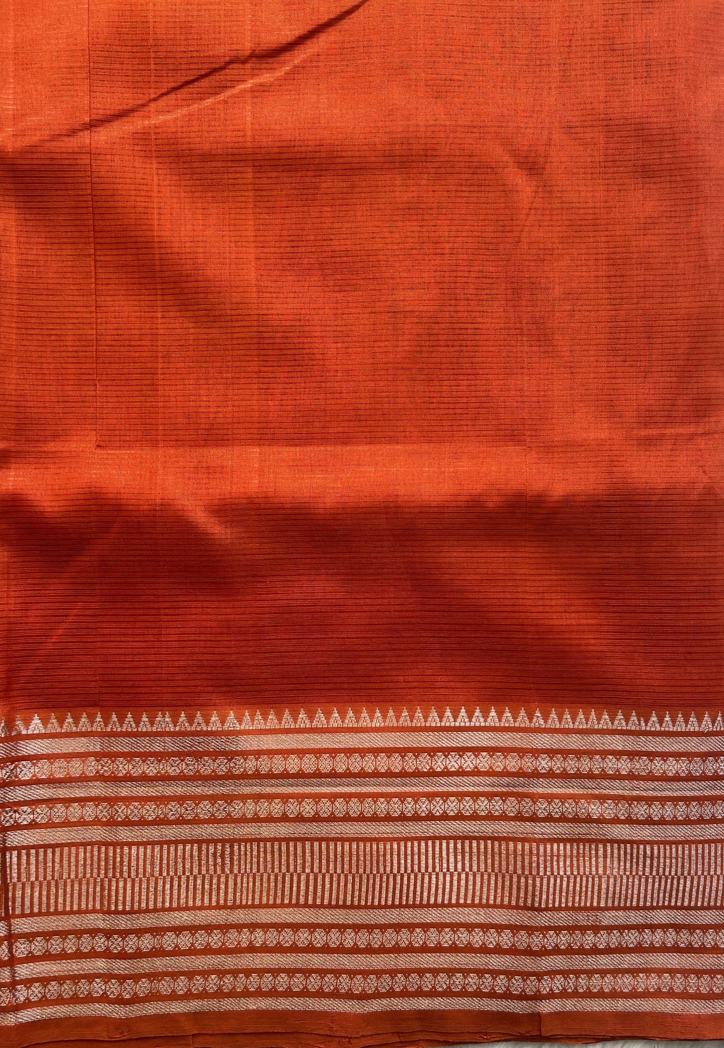 Mangalagiri Plain Pattu Saree Orange colored complemented with a Zari Border - Sampradaya Designer Studio