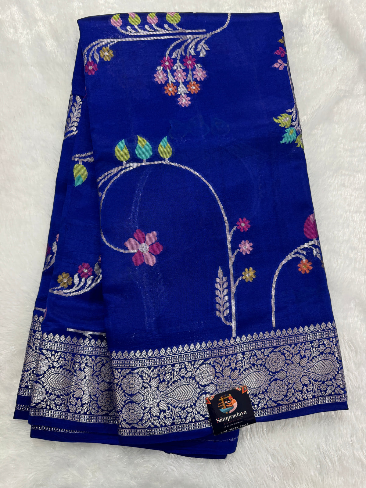 Pure Chiniya Silk Saree Blur Colored Elegantly Paired with a Gold Zari Border.