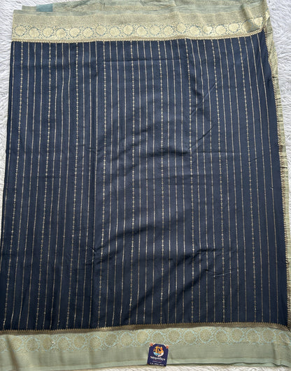 Semi Georgette Saree Black Colored Elegantly Paired with a Zari Border. - Sampradaya Designer Studio