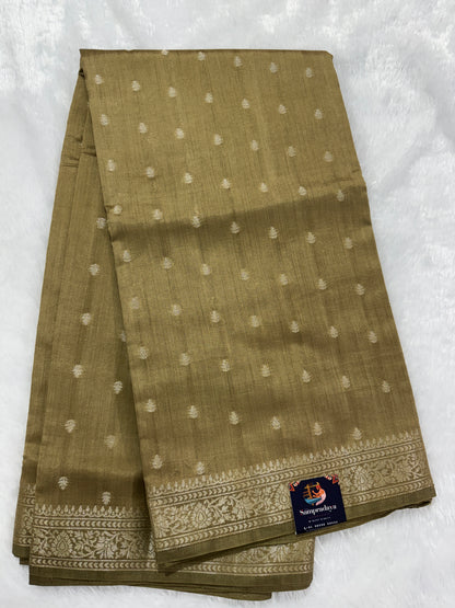 Pure Chiniya Silk Saree Gold Colored Elegantly Paired with a Gold Zari Border.