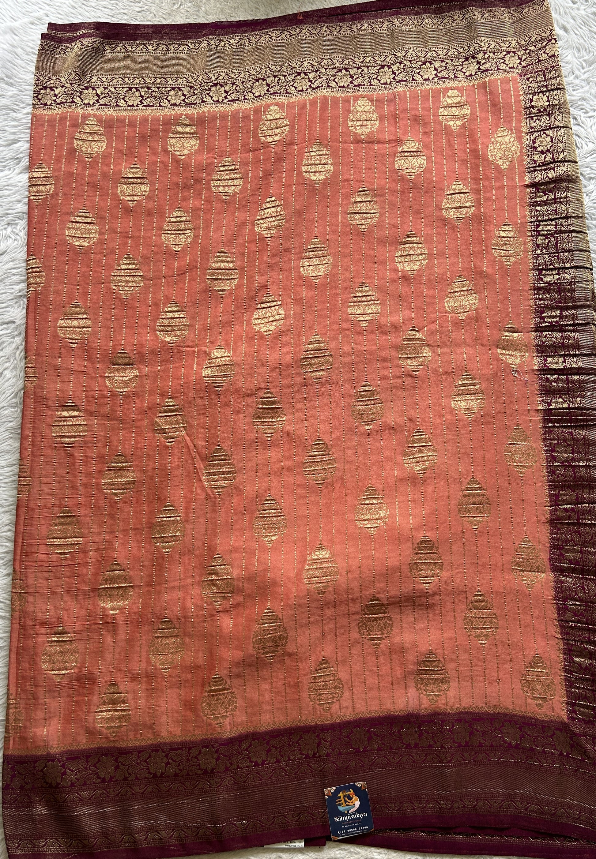 Semi Georgette Saree Dark Peach Colored Elegantly Paired with a Wine Color  Zari Border. - Sampradaya Designer Studio