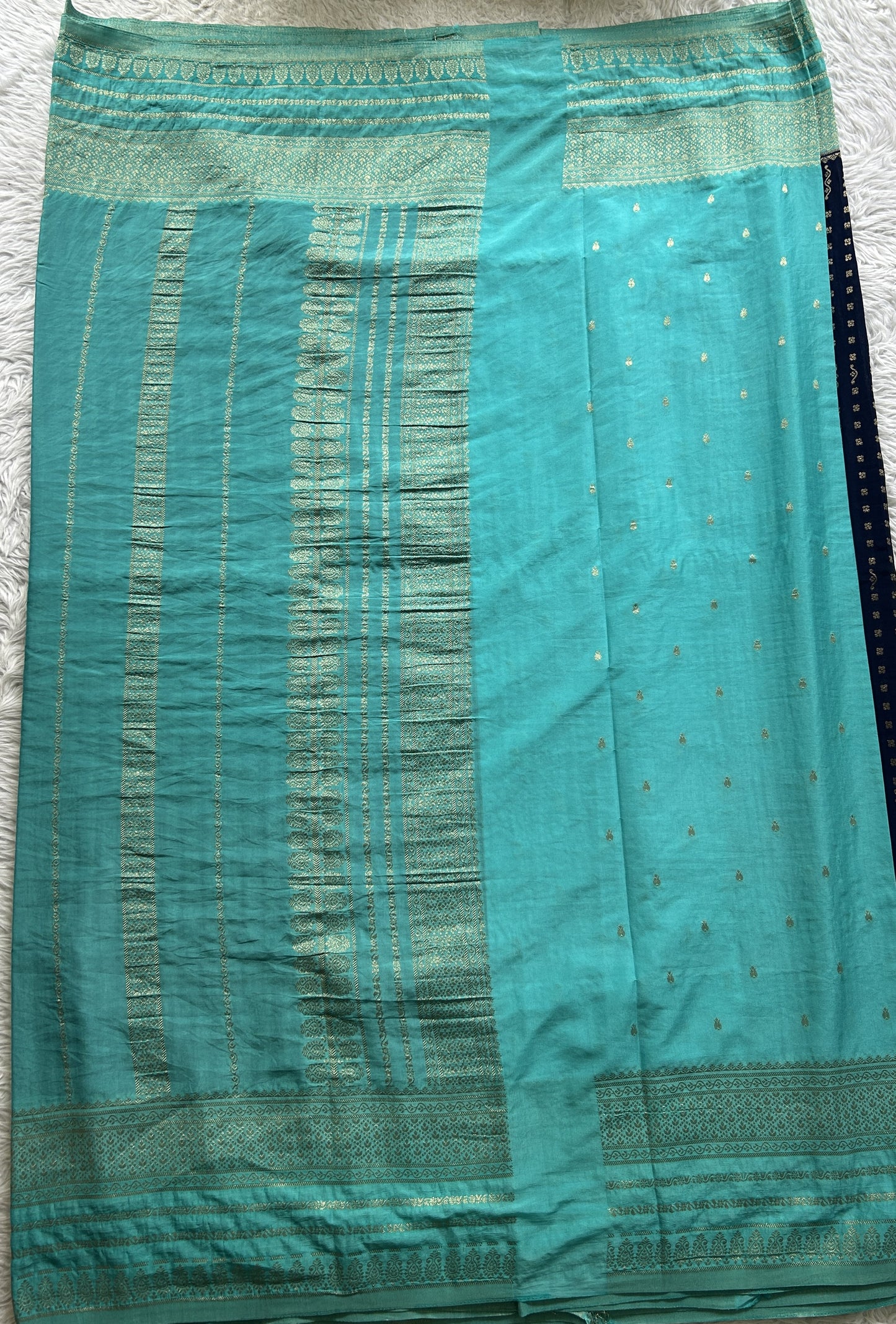 Semi Georgette Saree Navy Blue Colored Elegantly Paired with a Zari Border. - Sampradaya Designer Studio